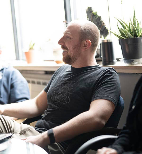 Sisyphus Staff Member Smiling
